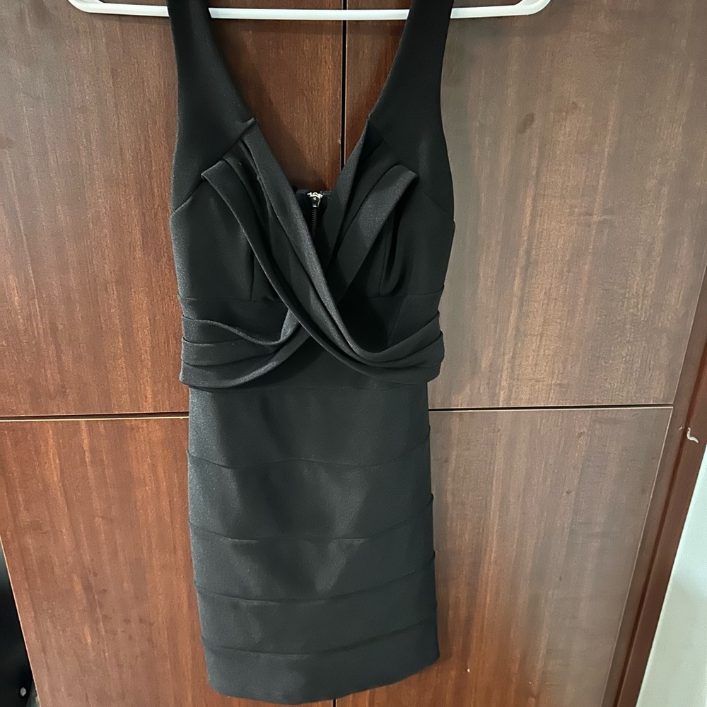 Black size 10 stretchy dress with a zipper in the back